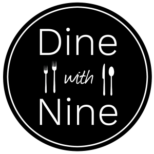 Dine with nine words on a dinner plate with two forks, a knife, and a spoon