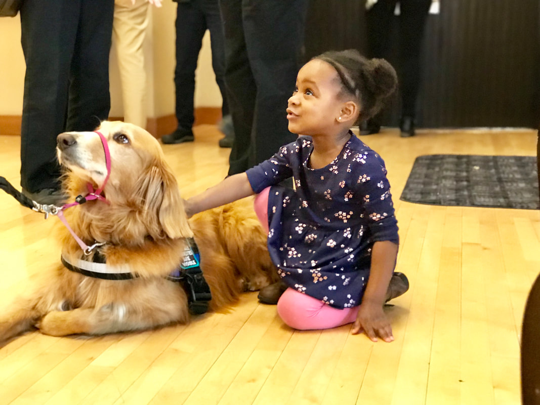child with service dog