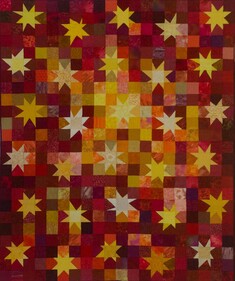 red orange and yellow quilted squares with quilted stars